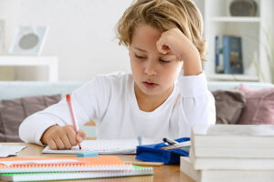 Child studying at home.